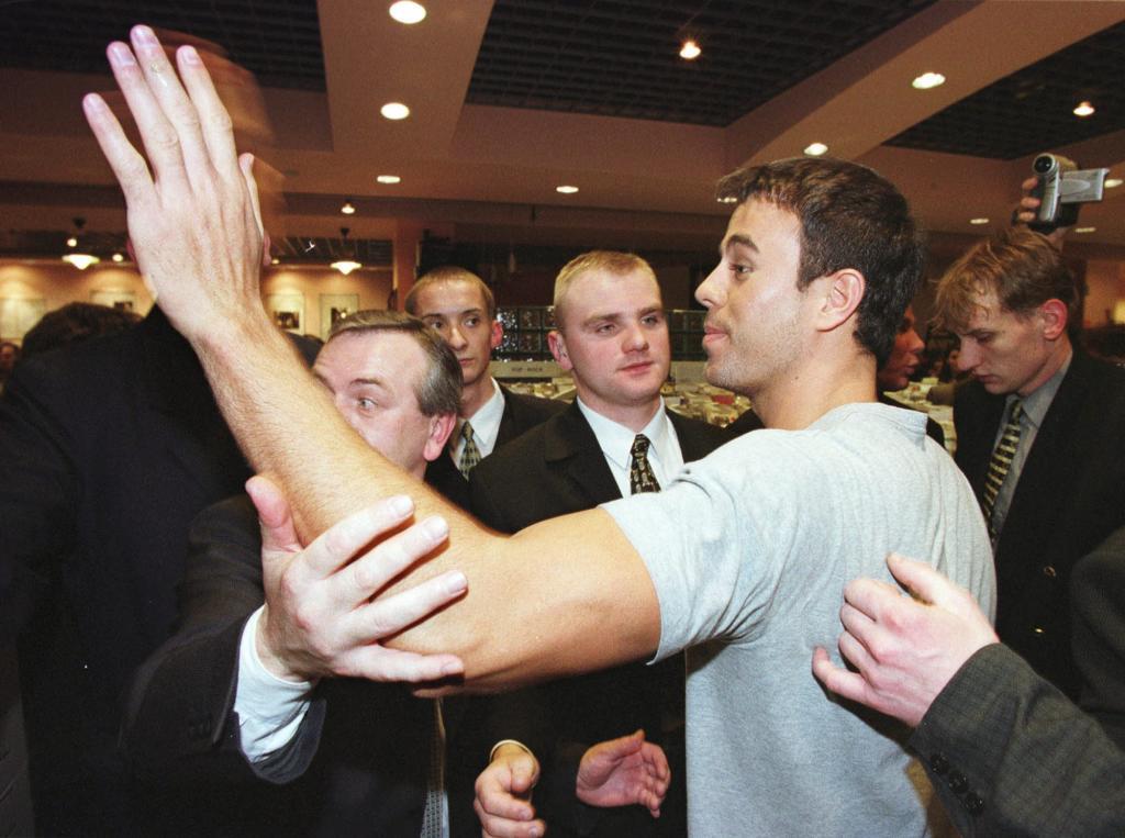 The singer arrives at a Warsaw store to sign autographs in 2000.