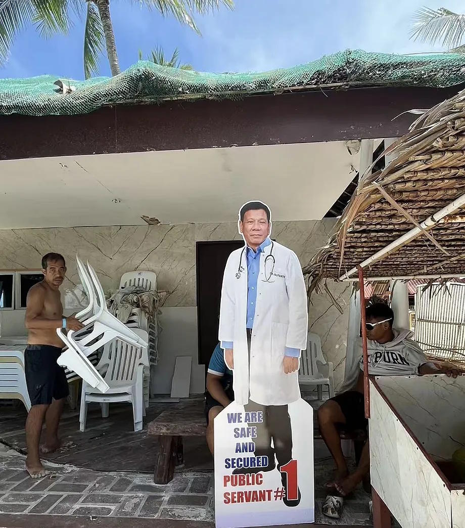 A life-size cardboard cutout of Rodrigo Duterte on a beach in Bohol.