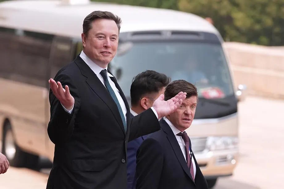 Elon Musk at the welcoming ceremony alongside Trump in China.