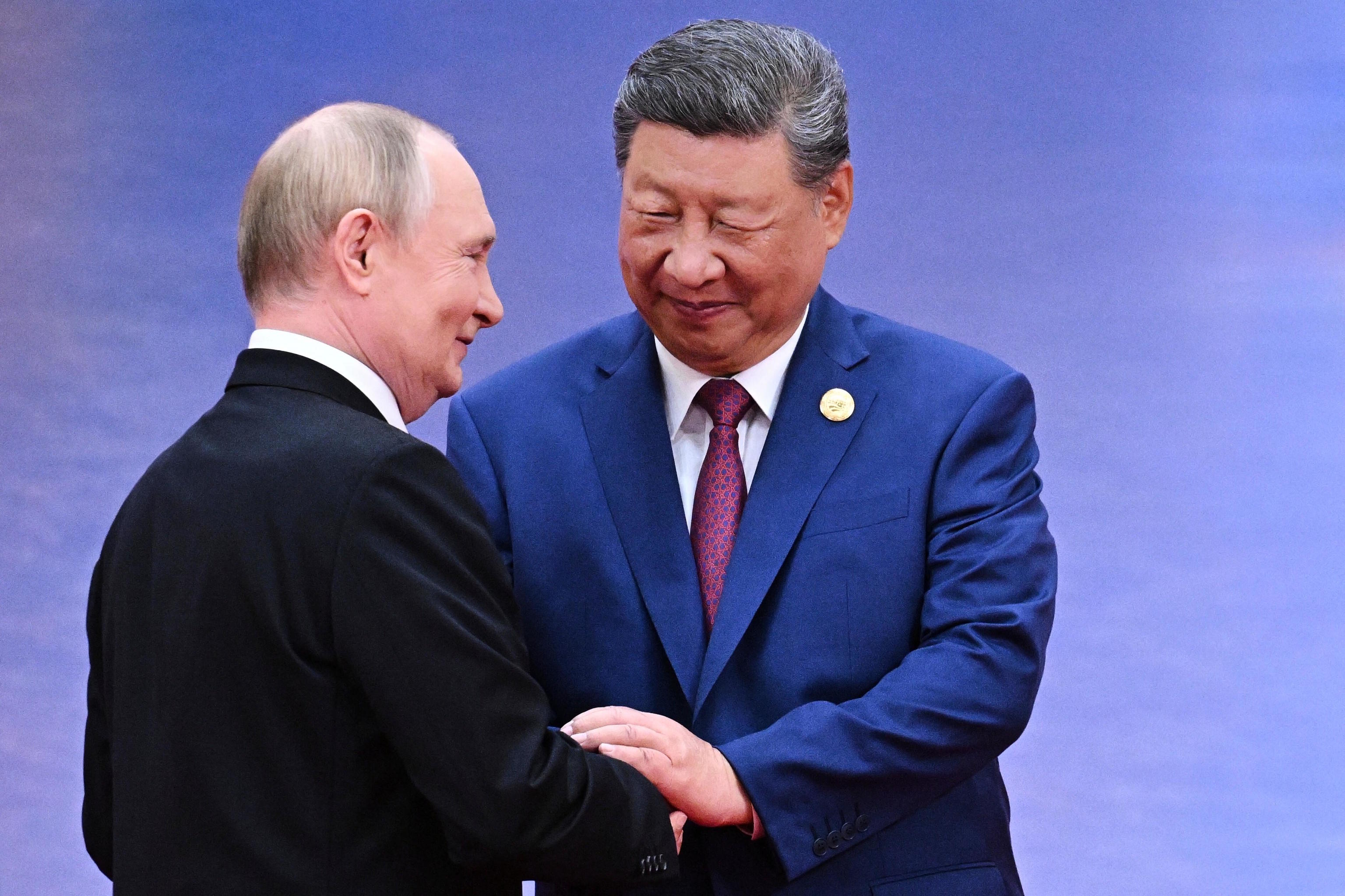 Russian President Putin, on the left, and Chinese President Xi Jinping.