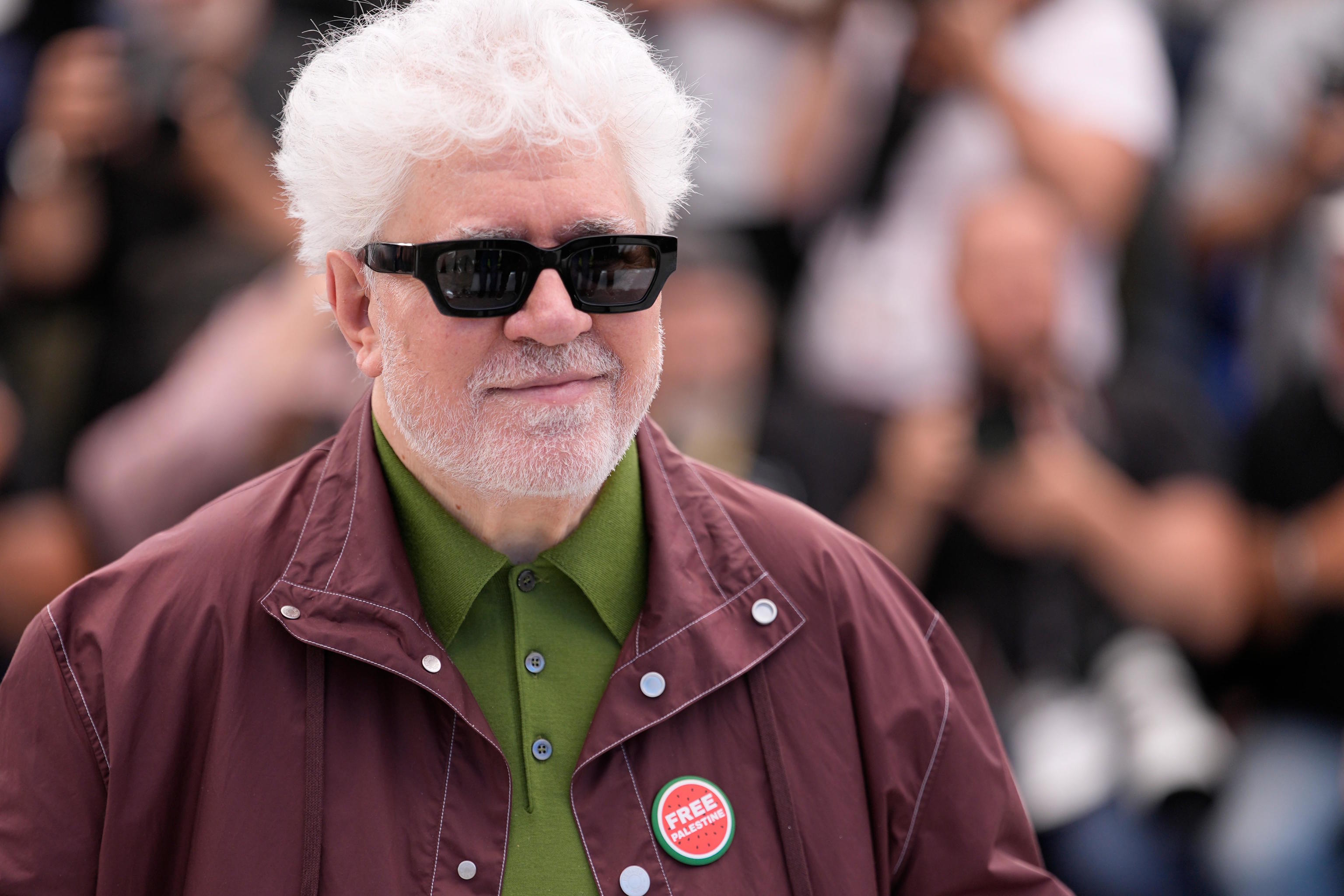 Director Pedro Almodóvar poses for photographers.