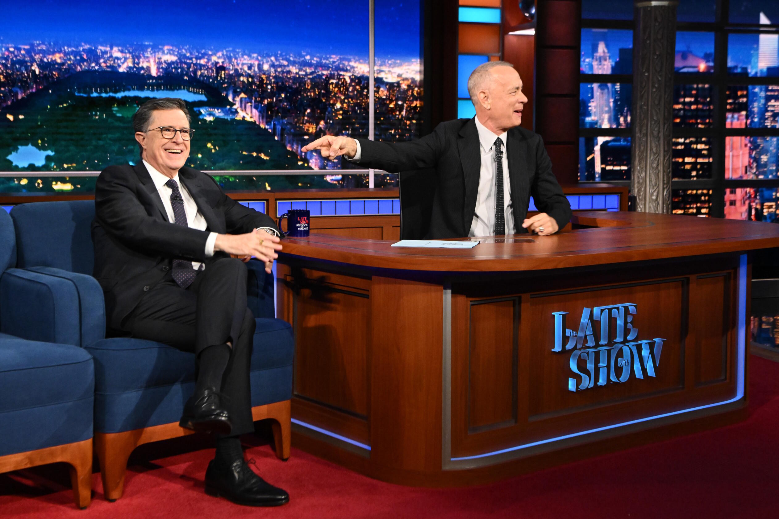 CBS shows host Stephen Colbert, left, with guest Tom Hanks.