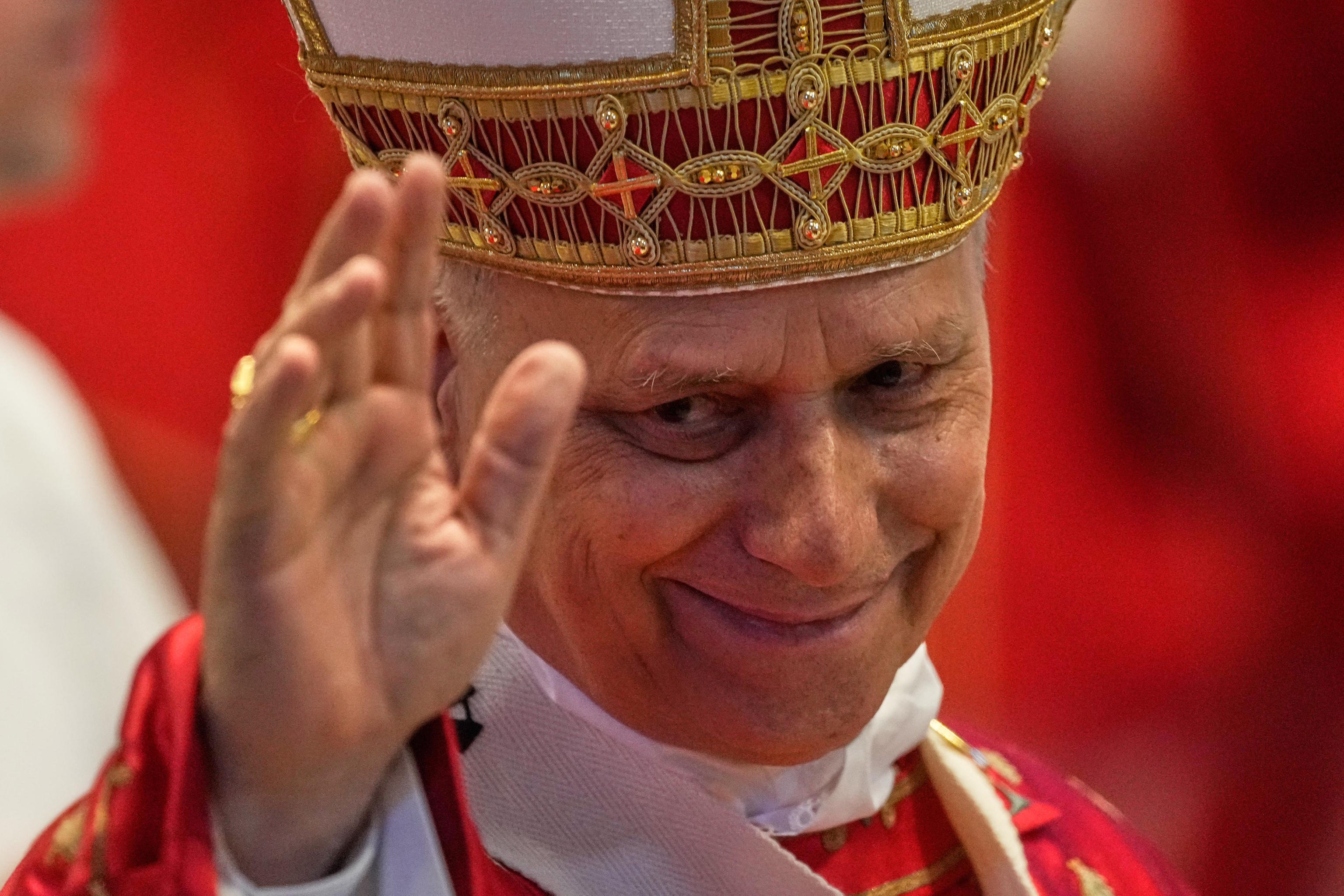 Pope Leo XIV greets the faithful.