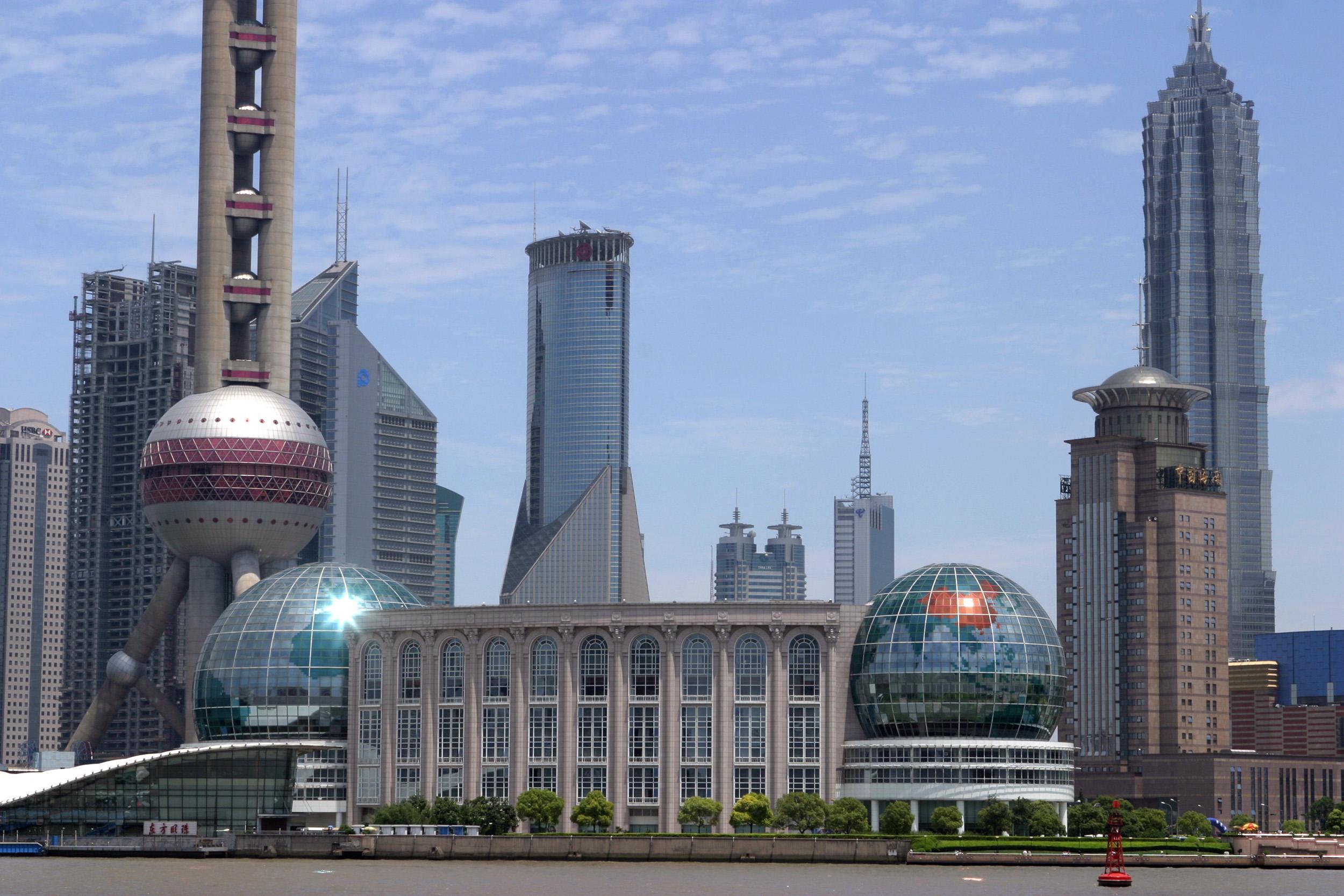 The skyline of the Pudong business district is pictured across the Huang Pu River in Shanghai.
