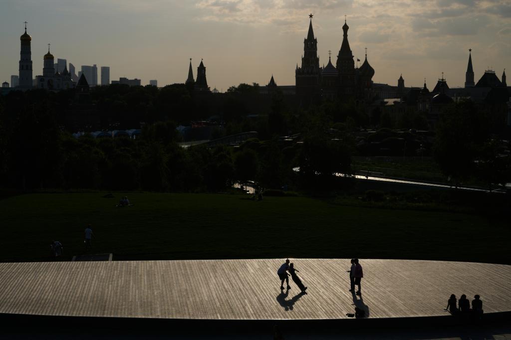 People walk at Zaryadye park.