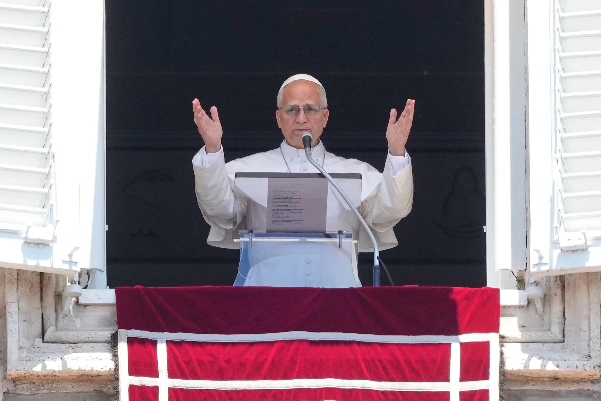 Pope Leo XIV delivers the Angelus noon prayer in St. Peter's Square.