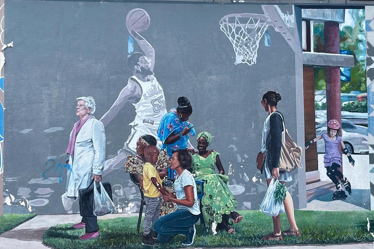 A mural about multiculturalism on the streets of Creil.