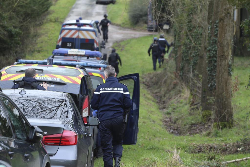 Gendarmes are deployed, near Lieruon, Brittany.