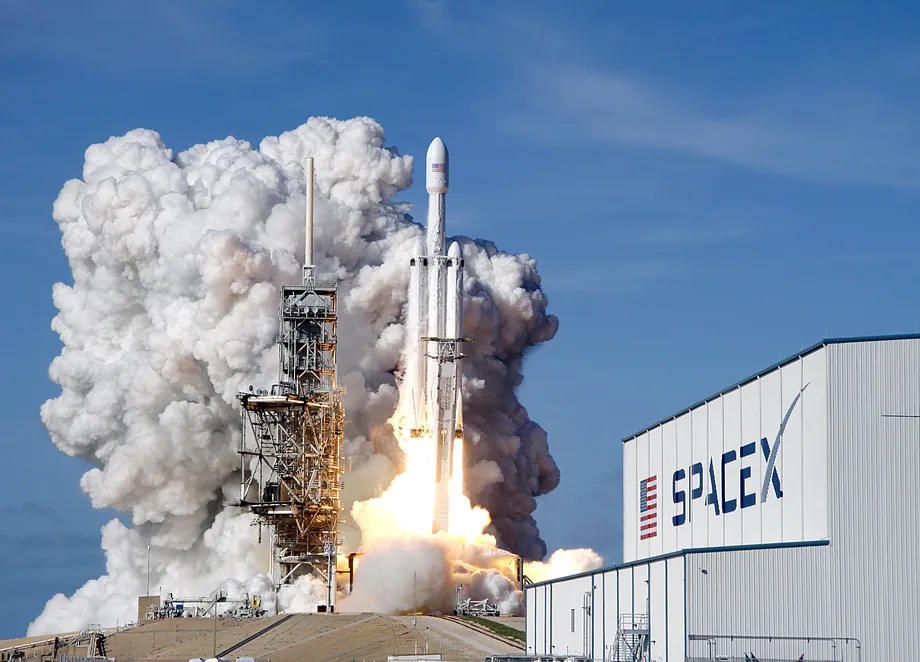 A SpaceX Falcon 9 heavy rocket takes off from Launch Pad 39A at Kennedy Space Center in Cape Canaveral, Florida.