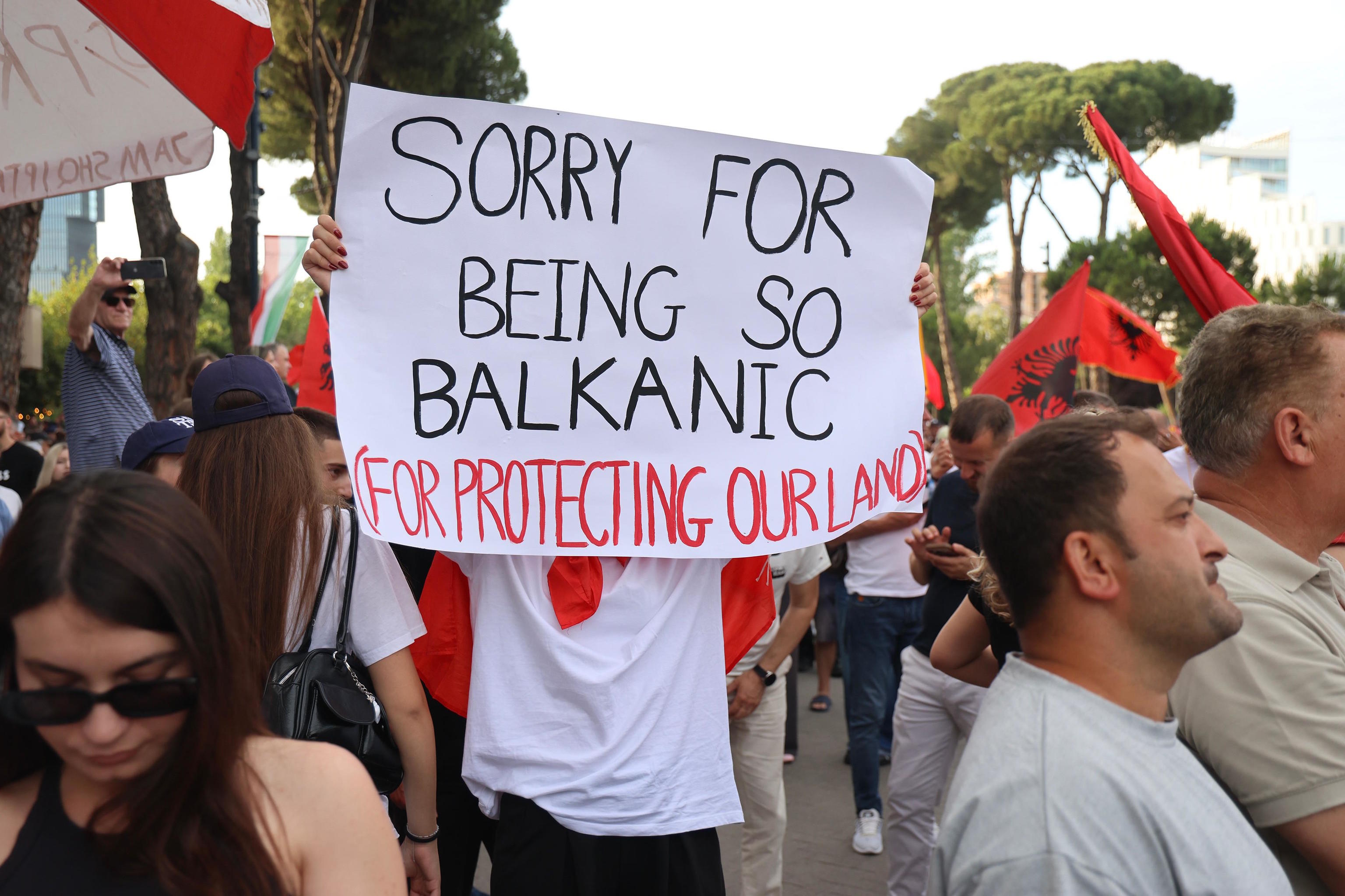 Protesters take part in a rally in Tirana.