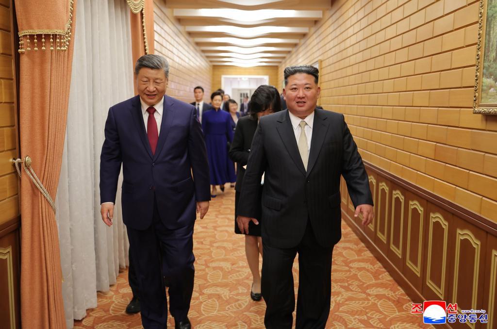 North Korean leader Kim Jong Un, right, and Chinese President Xi Jinping