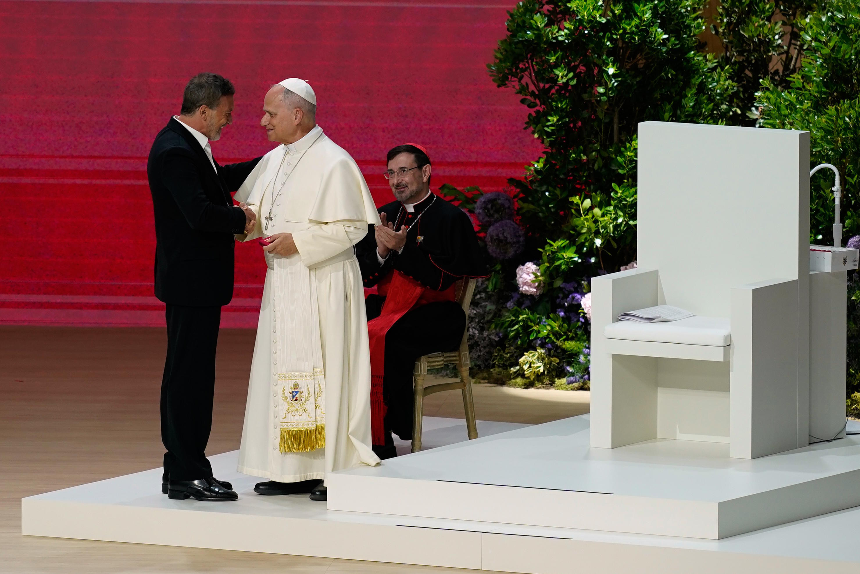Pope Leo XIV greets Antonio Banderas.
