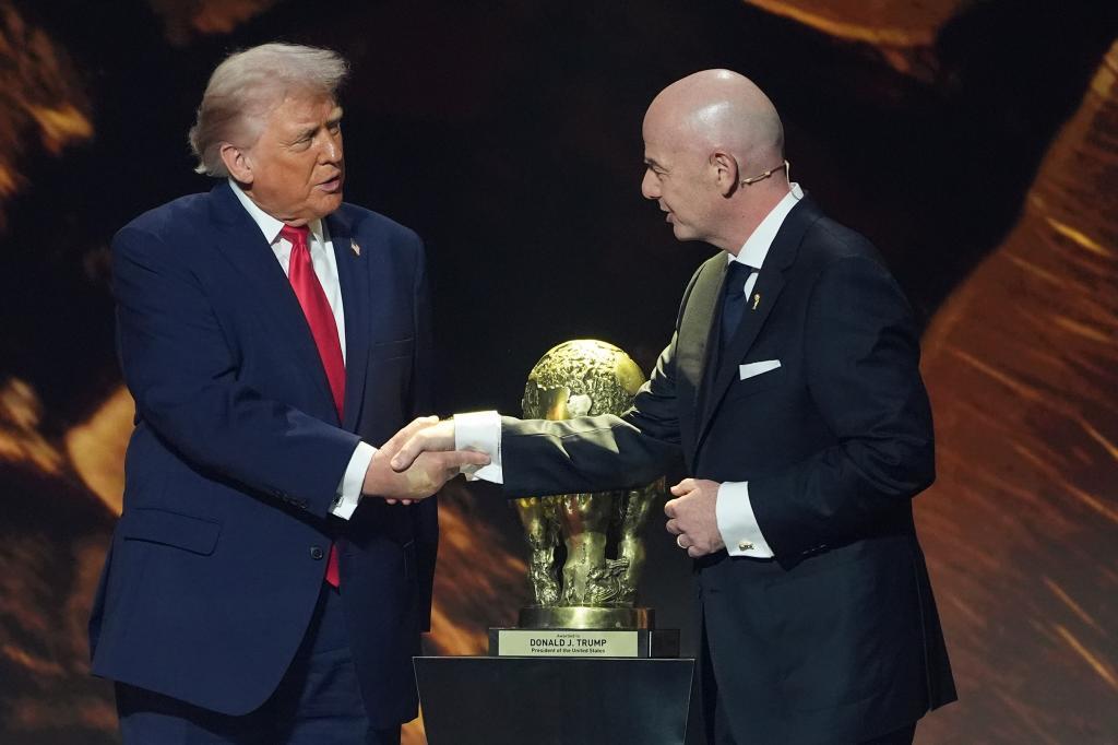 U.S. President Donald Trump shakes hands with FIFA President Gianni Infantino