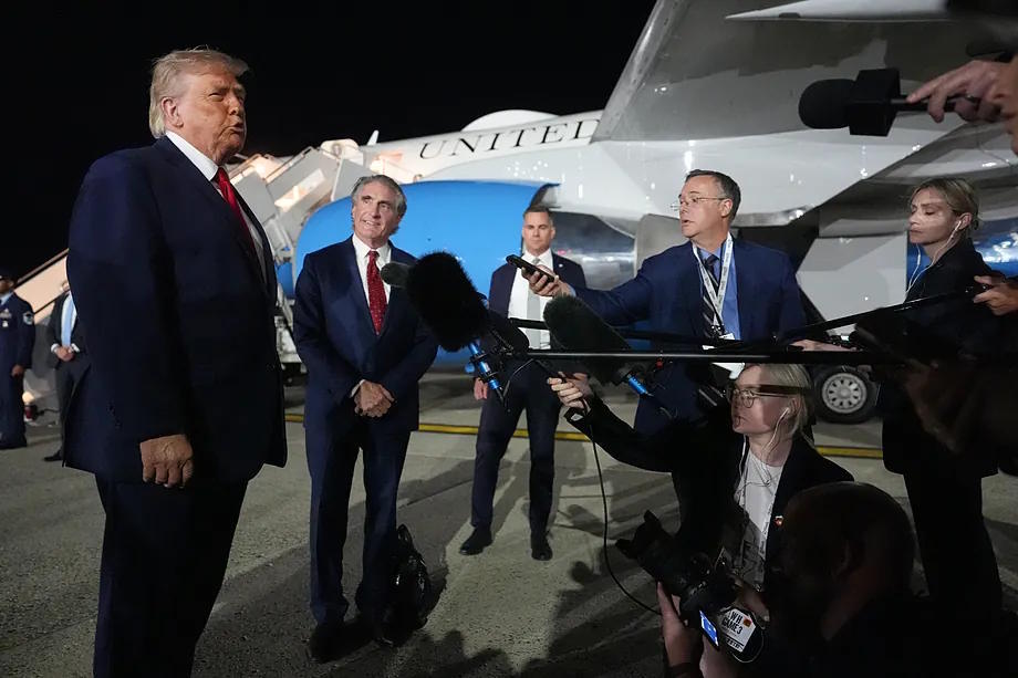 US President Donald Trump speaks to journalists before boarding Air Force One at John F. Kennedy International Airport in the early hours of Tuesday, June 9, 2026, in New York.
