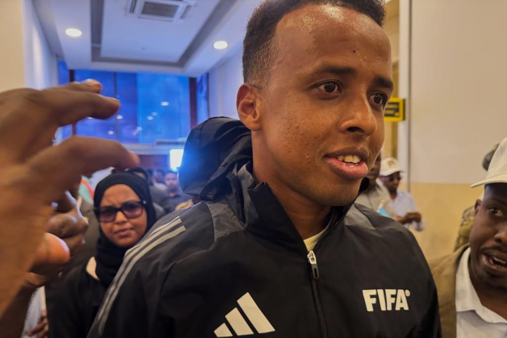 Referee Omar Artan, who was denied entry to the United States, arrives in Mogadish