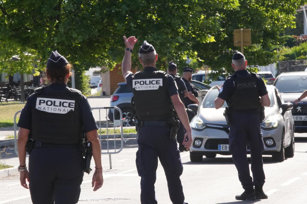 France Police officers control cars.