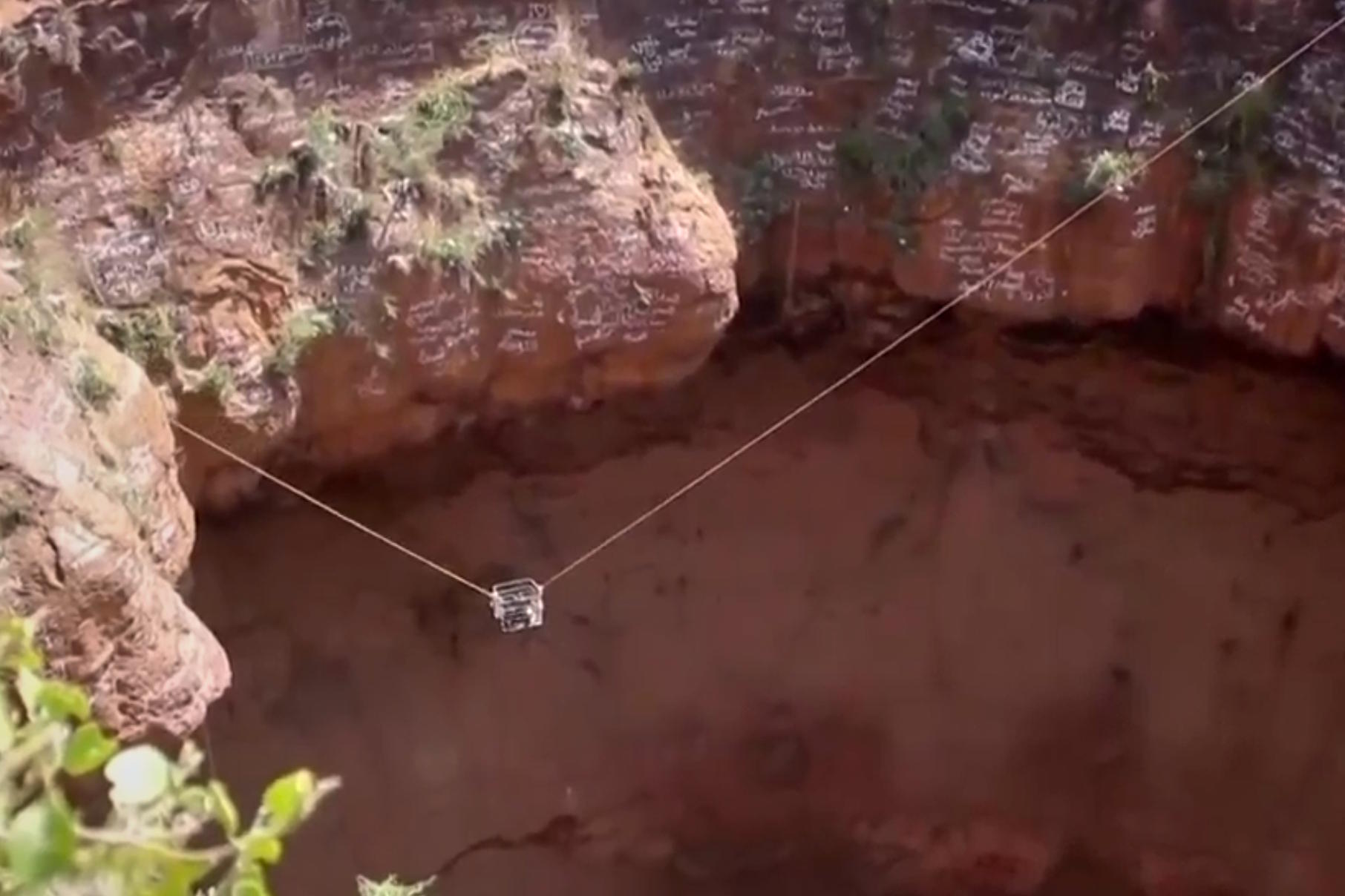 Rescuers removing the body of daredevil adventurer Al-Qaqa Ibn Antar.