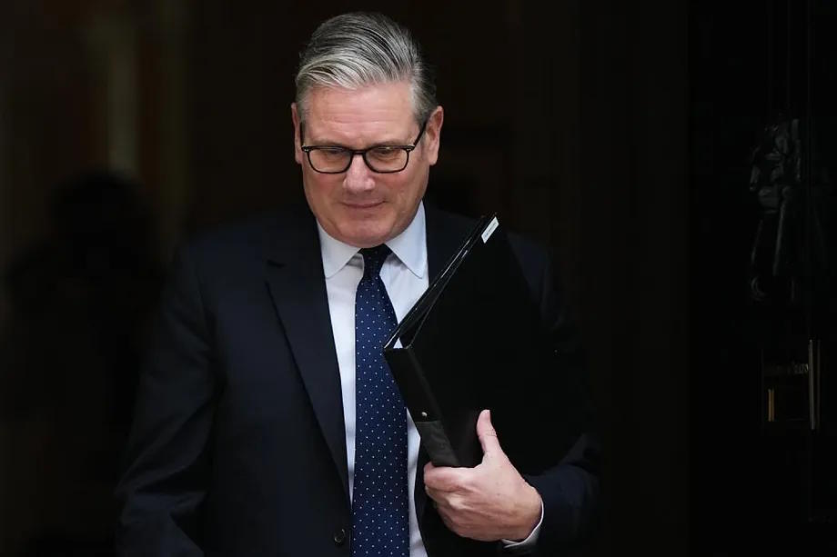 British Prime Minister Keir Starmer leaves 10 Downing Street in London.
