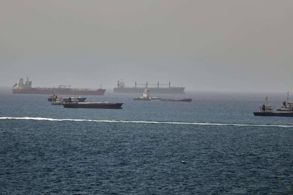Tankers and cargo vessels are seen in the Gulf of Oman