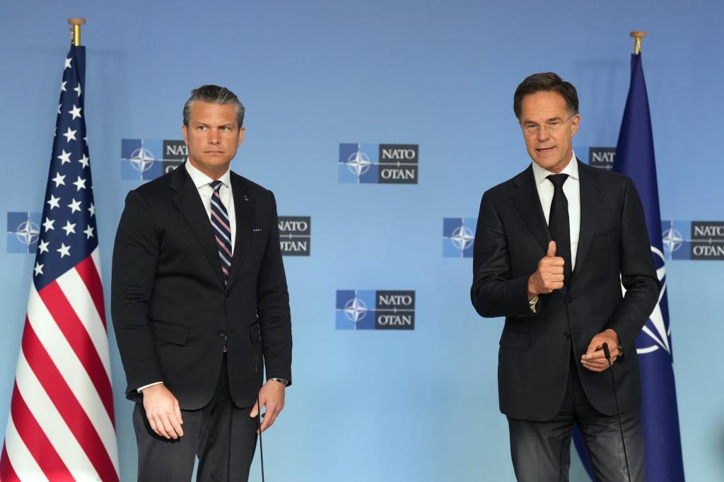 United States Defense Secretary Pete Hegseth, left, and NATO Secretary General Mark Rutte