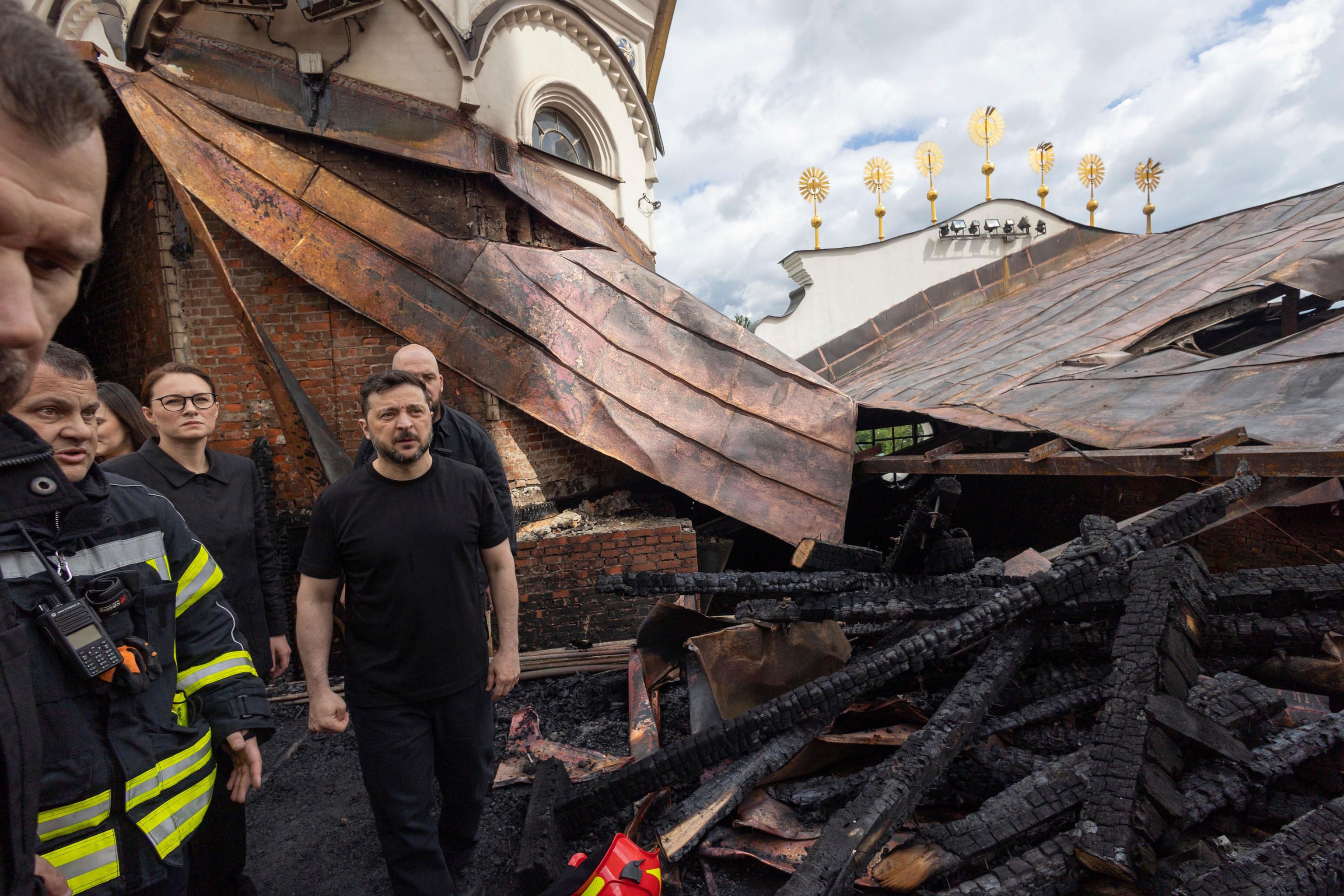 Zelensky and Prime Minister Yulia Svyrydenko visit the ruins of the Dormition Cathedral.