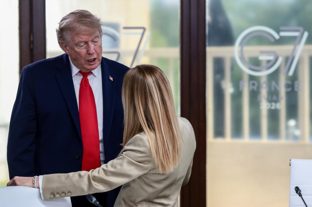 President Donald Trump speaks with Italian Prime Minister Giorgia Meloni