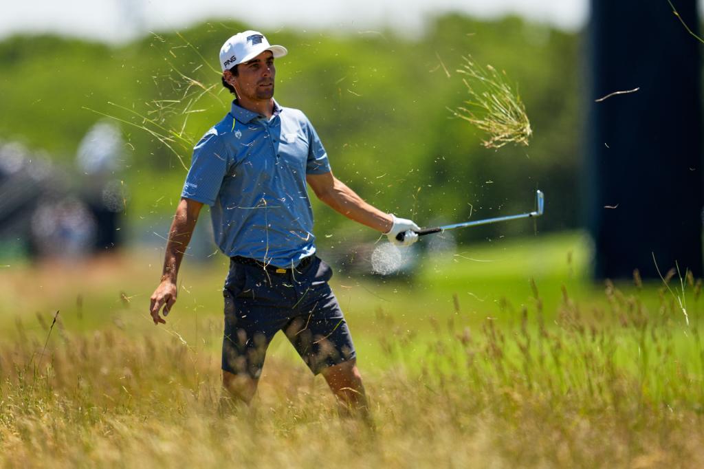 Joaquin Niemann hits from the rough on the third hole during a practice round for the U.S. Open
