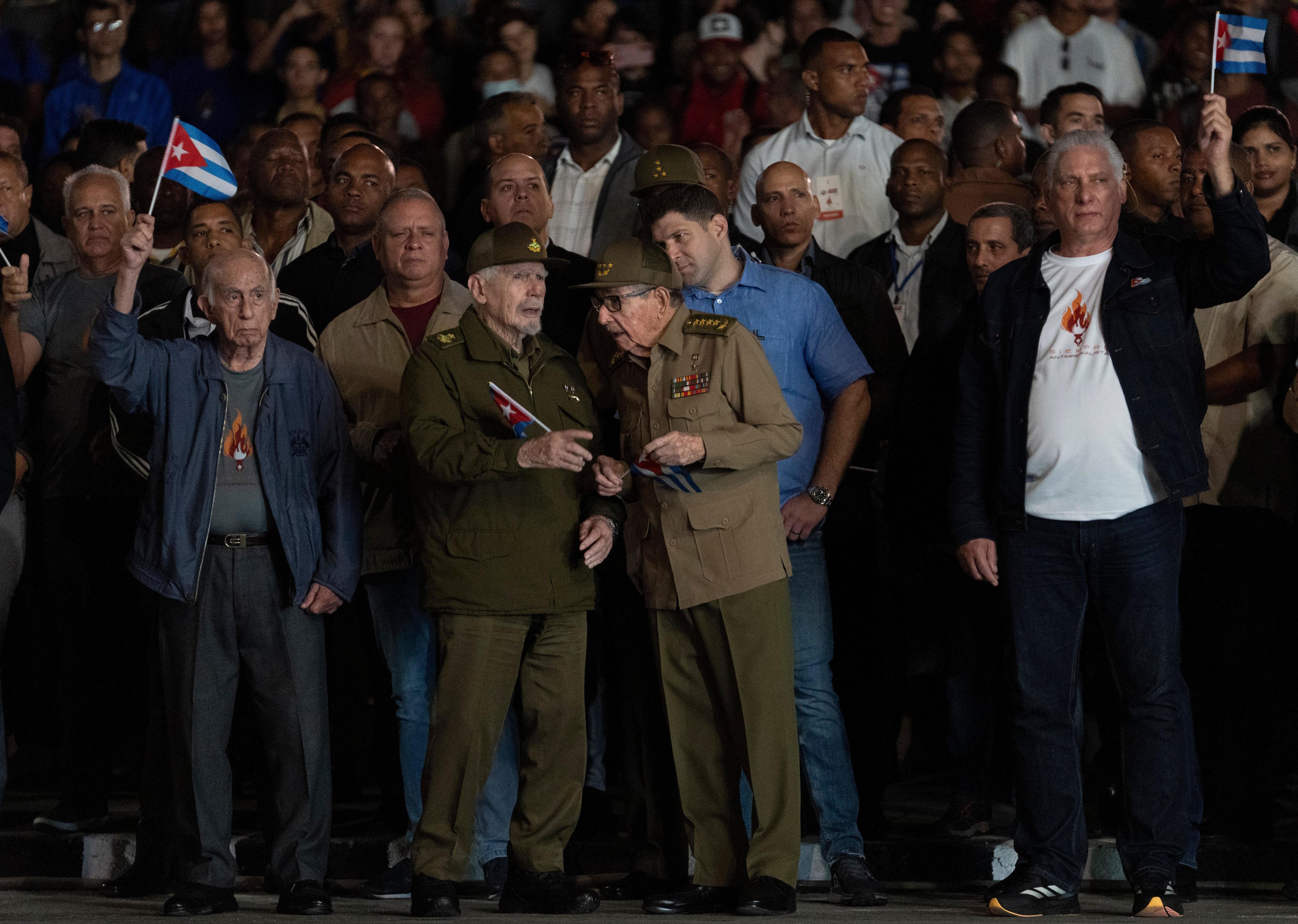 Commander Ramiro Valdes, center left, with Raúl Castro (center).