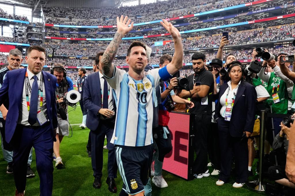 Lionel Messi leaves the field after Argentina's 2-0 victory over Austria