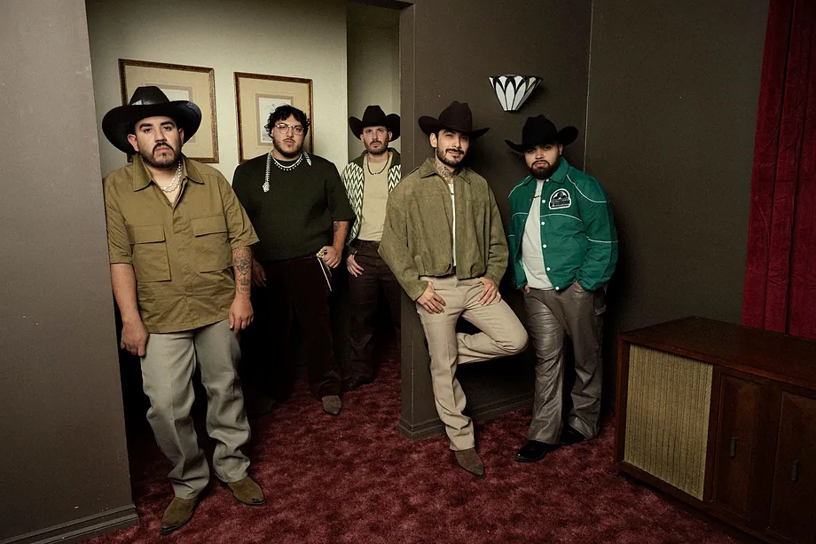 In April 2022, six young people with Puebla hats, born on both sides of the Mexico-United States border, appeared on TikTok with a version of Morat's "No se va" stripped of its pop base and loaded with Mexican northern cumbia. The one who provided the vocals, Payo Sol�s, had just finished high school in the Rio Grande Valley in Texas. His colleagues were involved in livestock, photography, finance, and managing a trucking company. Thus, Grupo Frontera was born.

In four years, following the viral success of "No se va," that sextet of twenty and thirty-year-olds has become one of the most solid groups in the Latin spectrum with their immersion in Mexican regional music. They have collaborated with Bad Bunny, Shakira, Maluma, Car�n Le�n, and Myke Towers. They have created their own record label, BorderTown Records, to launch new groups from the Valley. And now they are taking on Europe. "Triste Pero Bien C*br�n" is their first tour on the continent, starting in Paris on June 25 and with four stops in Spain: Barcelona on June 26, Gran Canaria on July 4, Marbella on the 6th, and Madrid on the 9th.

Madrid gets wild with Bad Bunny: dancing reggaeton to the max and the Metropolitano stadium rocking
Julieta Venegas: "Cruelty towards immigrants has existed in the United States for a long time"
"All of this started with the dream of getting together every weekend to play at quincea�era parties and weddings to earn a little more money for our families. 'No se va' exploded, and Juli�n [Pe�a, who plays the congas] was the one who took the first step to quit his job. Gradually, all of us left ours because they wanted us in Houston or California. When you put all your faith in God and trust, He has a plan for you," says Payo Sol�s, accompanied by Juan Javier Cant�, second voice and accordion player.

They did it even though none of the band members knew anything about the music industry, not even how to make their music available on digital platforms. "We knew nothing, literally nothing, about the industry, but it was a risk we had to take if we wanted to see our dreams come true. We didn't even know how to upload our music to platforms; we searched on Google and YouTube how to do it. Some of us didn't even know what TikTok was back then," insists the vocalist. Ironically, the Chinese social network was the one that laid the foundation for this career that begins in the United States but cannot be understood without Mexico and its folklore.

All members of Grupo Frontera have some connection to Mexico. They were either born there, spent part of their lives in its regions, or their families come from Mexico. Moreover, in all of their homes, northern cumbia - and other traditional genres like mariachi or tumbado - have played, which are now present in their songs, sometimes mixed with current urban genres.

"We have always been proud to be Latinos; the northern cumbia we make is what we grew up listening to at home. We have always tried to promote our music, our sound, our culture," says Sol�s. He continues, "We would love to think that the rest of the world is enjoying listening to the music we grew up with. In our latest EP, there is a bolero, 'Cu�ntame,' that I remember listening to when I was eight or nine years old in the truck with my dad or at family barbecues. It's a pride that people are now listening to that as if it were something more urban."

We are border people. The criminalization of immigrants feels more personal to us. We have family, uncles, grandparents, and even partners who are trying to fix their immigration status, and from the beginning, we have always said that we are here to help people as much as possible, to represent Mexican culture. We donate to the consulates where we are from; we went to donate to the Monterrey consulate [in California] to those who are fixing their cases and do not have enough money to pay a lawyer. More than 20 families have resolved their cases with our help.

Payo Sol�s's grandparents and parents crossed the Mexico-United States border before he was born. Juan Javier Cant� was born in Monterrey. Beto Acosta, the band's bassist, lived most of his life in Reynosa, in the northern state of Tamaulipas. And the group's name says it all. They are children of that border crossing, living halfway between two cultures, like many other Americans, especially in the southern states.

"We feel the pain of seeing how they are treating our people. This hits home, personally. These are things we have experienced and seen firsthand. It hurts us to see that people are suffering the same way our parents and families suffered," explains Sol�s. And for the first time, Cant� adds, "This reinforces our idea of reclaiming Mexican culture because they will not silence Mexicans or Latinos. Now that we have more voice, we cannot remain silent. We all have to speak up and help; there is no other option."

In their desire to help in different areas, the members of Grupo Frontera have wanted to delve deeper since the beginning of their career. On their way to a concert in Houston, a father contacted them to sing "No se va" to his terminally ill son. They went there to fulfill the request of someone who wanted to bid farewell to his son with a song of heartbreak and pain. "Love and pain always come together; you cannot have love without knowing that there will be pain in the future. Singing about pain and love is basically singing about the same thing in any type of relationship."