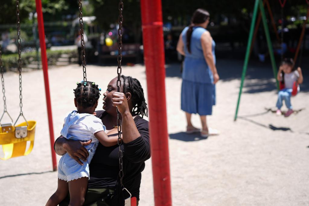 Vivianne Petit Frere holds her granddaughter Alexca