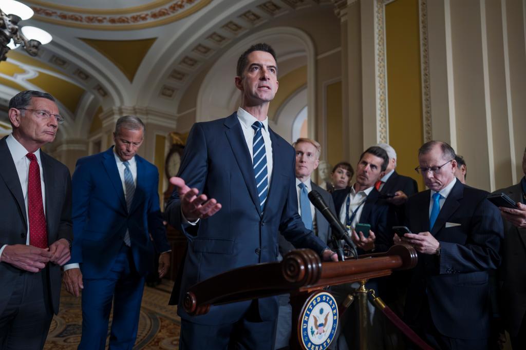 Sen. Tom Cotton, R-Ark., the chairman of the Senate Intelligence Committee, center, is joined from left by Sen. John Barrasso, R-Wyo., the GOP whip, and Senate Majority Leader John Thune, R-S.D.