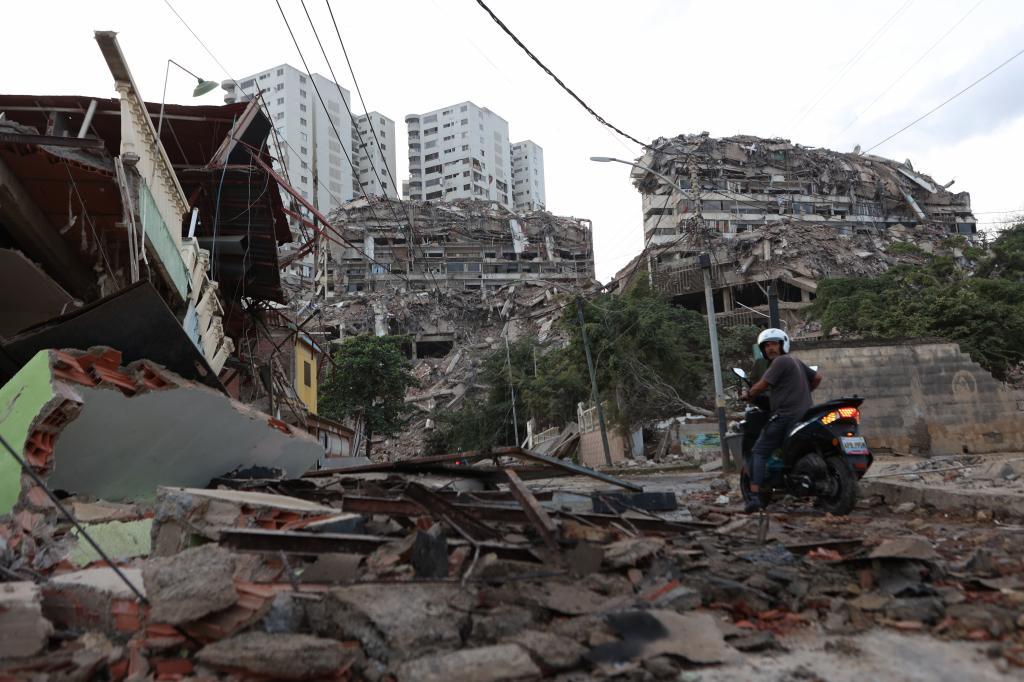 Buildings damaged by an earthquake stand in Catia La Mar, Venezuela,
