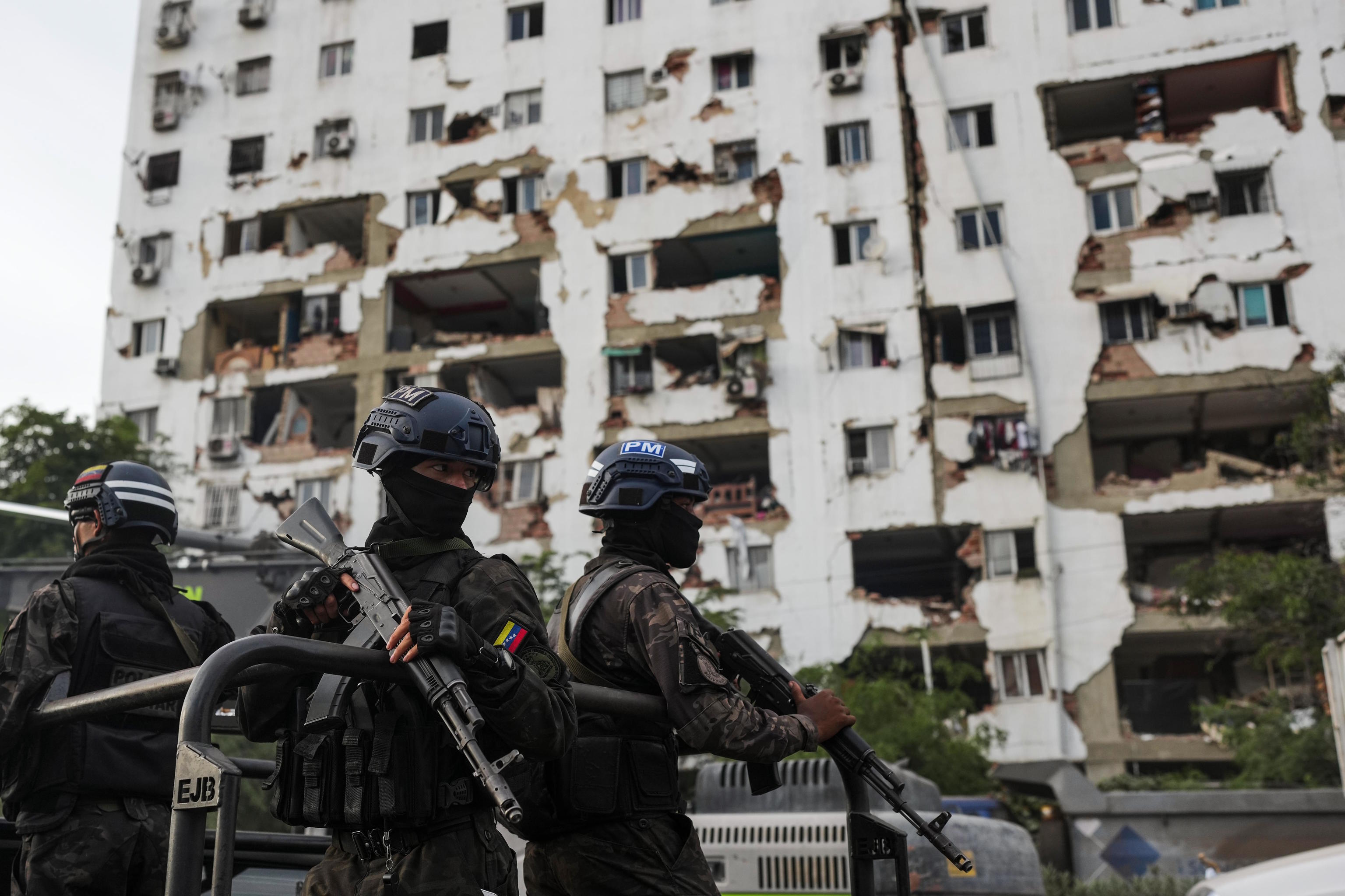 Venezuelan Military Police patrol an area affected by the earthquakes.