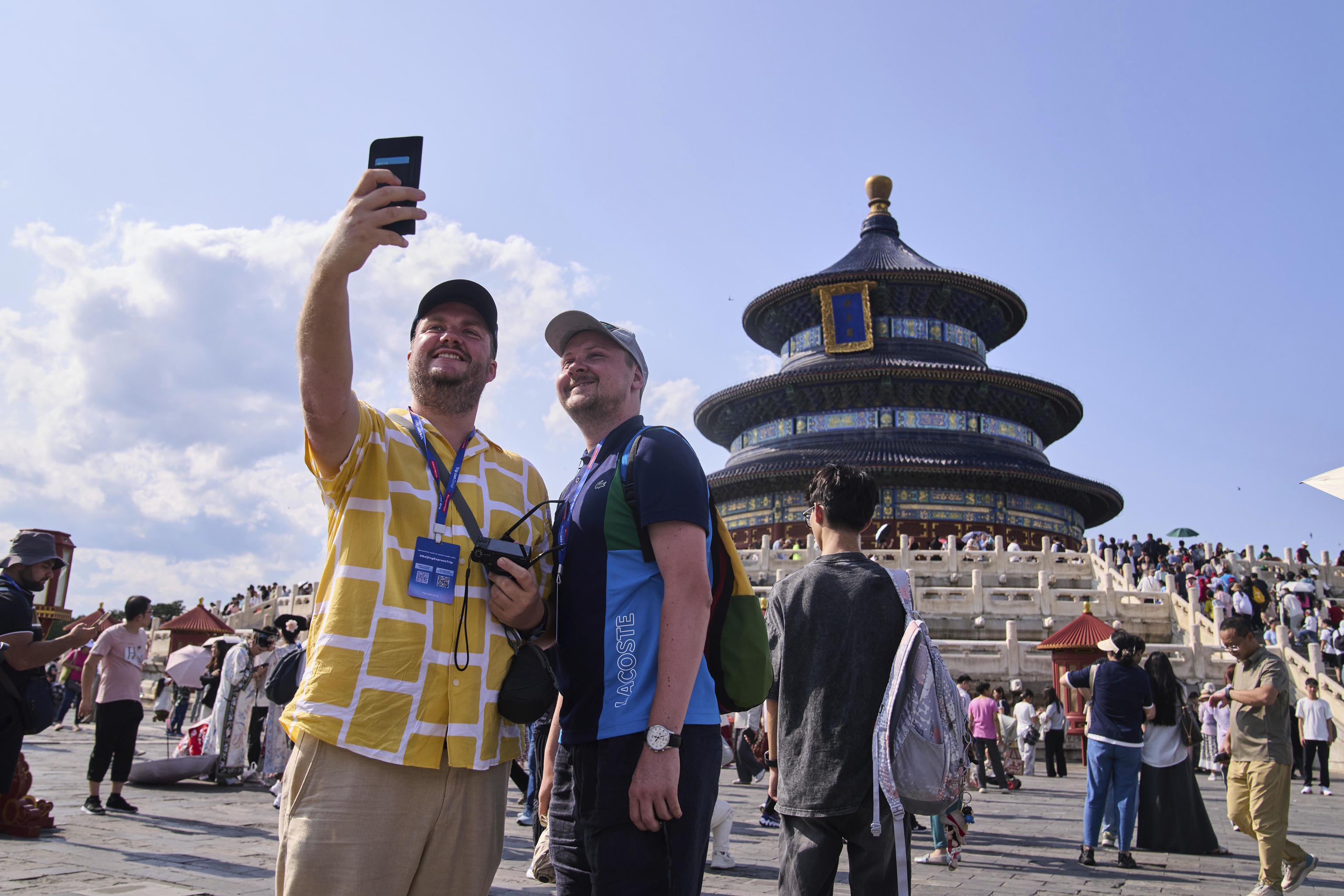 Tourists take a selfie at the Temple of Heaven in Beijing.