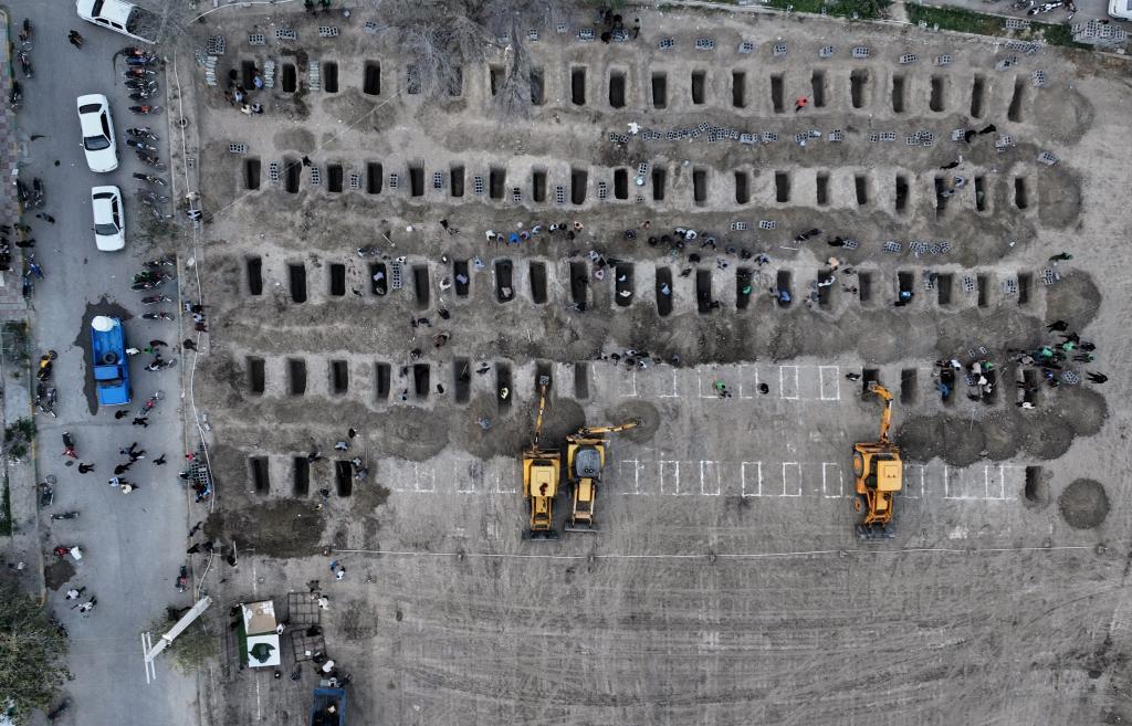 Graves being prepared for the victims, mostly children, of a strike Feb. 28 on a primary school in Minab, Iran