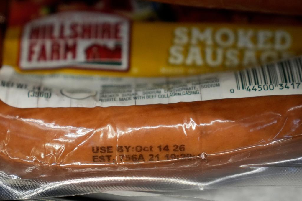 A Use By date is stamped on package of smoke sausage