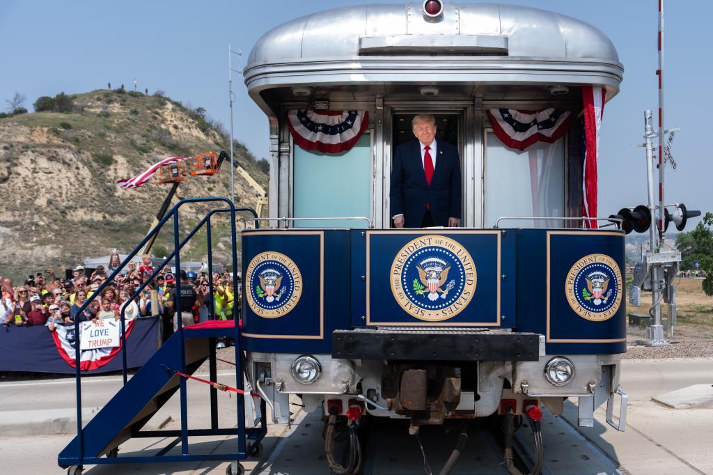 President Donald Trump disembarks a Freedom 250 train