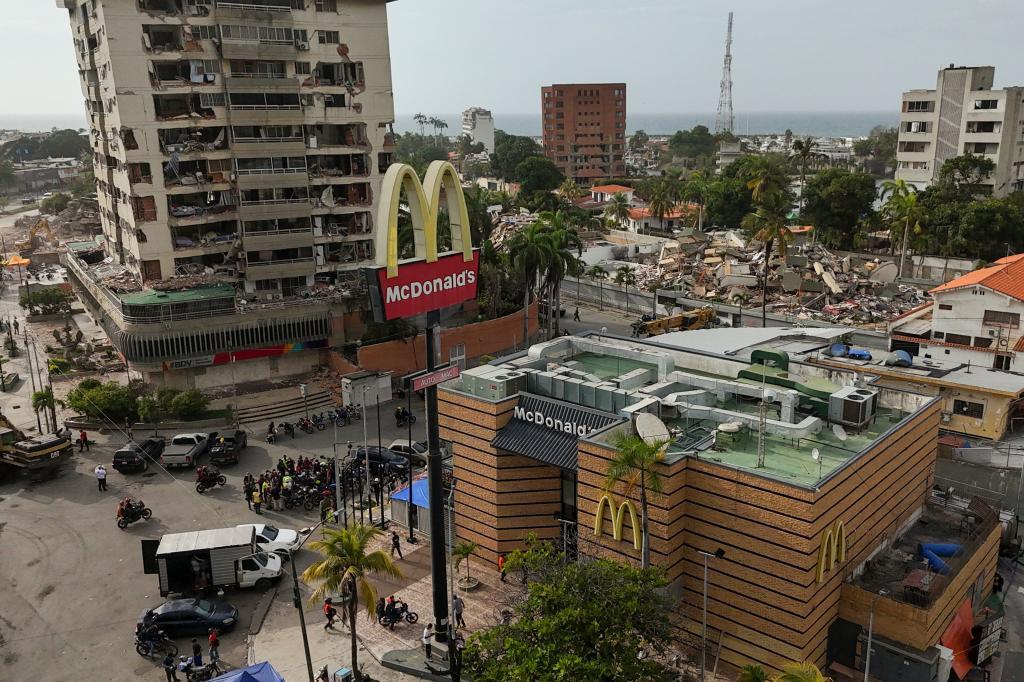 A McDonald's restaurant is being used as a temporary health center and pet reunification center after the earthquakes that struck La Guaira