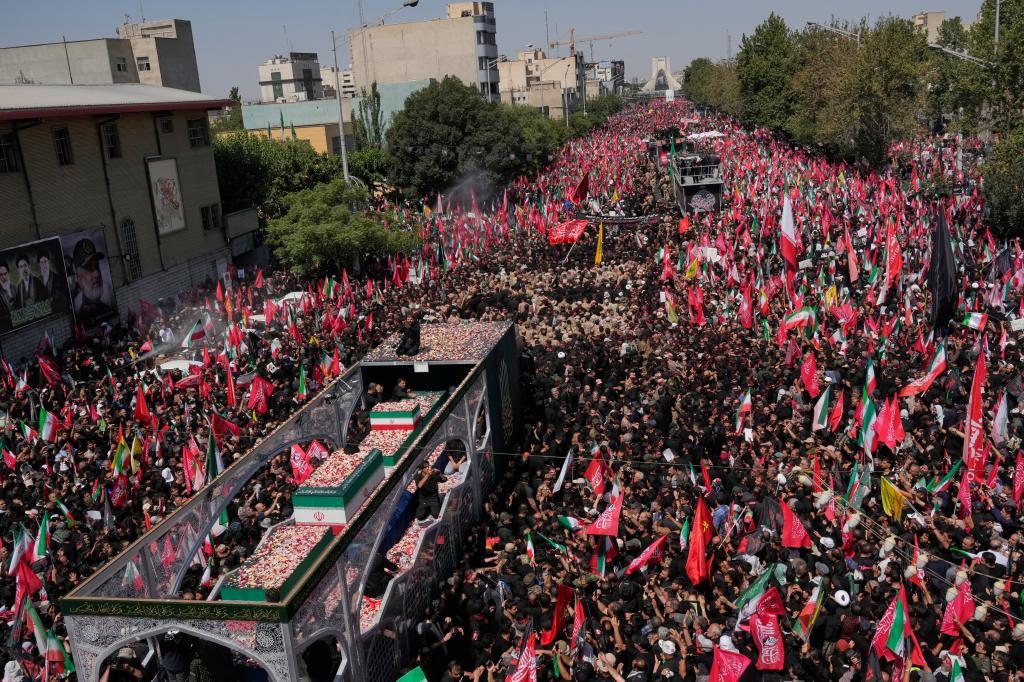 The truck carrying the coffins of the slain Iranian Supreme Leader Ayatollah Ali Khamenei