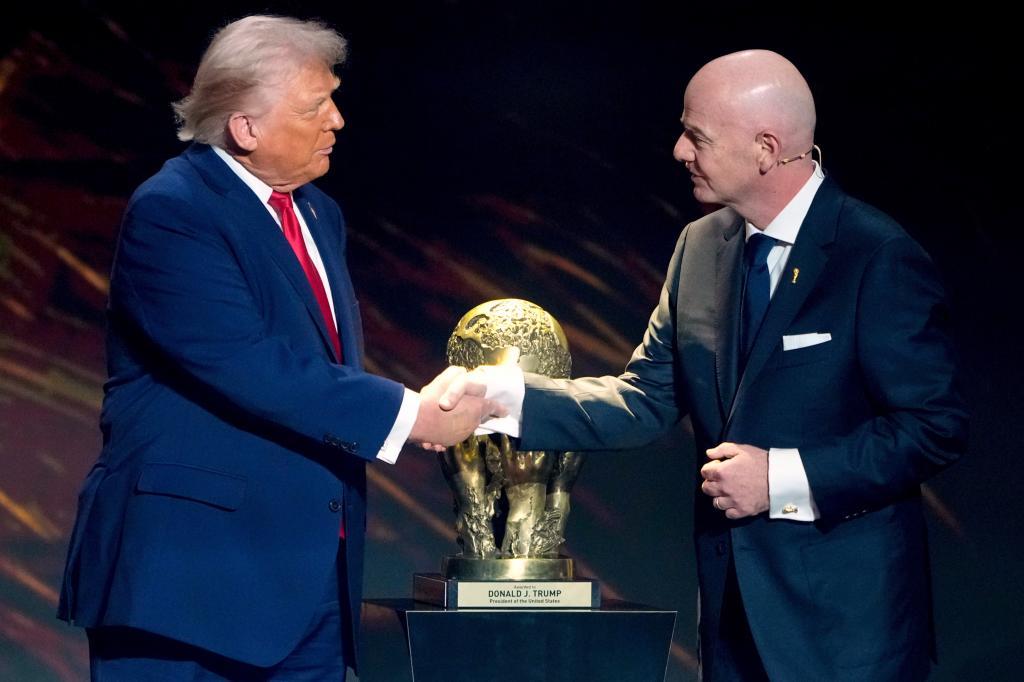 President Gianni Infantino, right, awards President Donald Trump with the FIFA