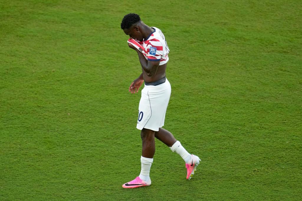 United States' Folarin Balogun (20) reacts to a red card during the World Cup