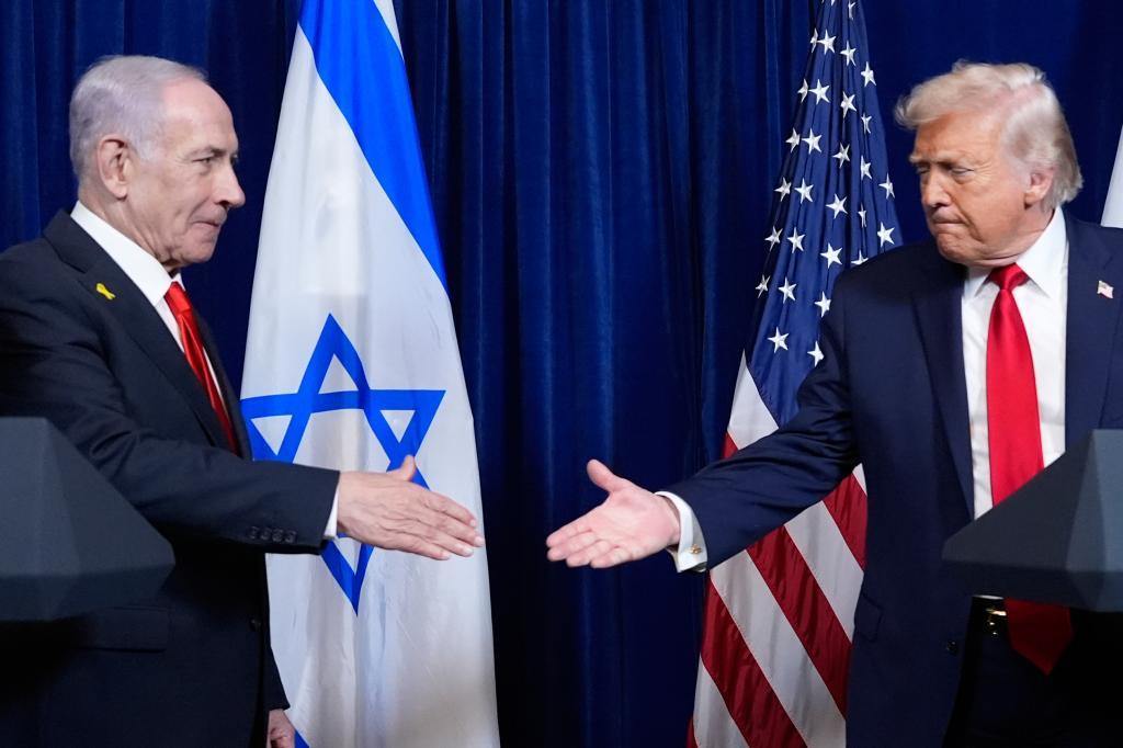 President Donald Trump shakes hands with Israel's Prime Minister Benjamin Netanyahu