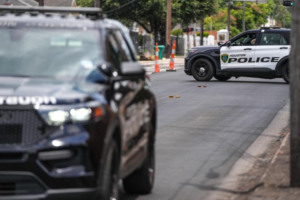 Police are working on Canal Street in Houston.