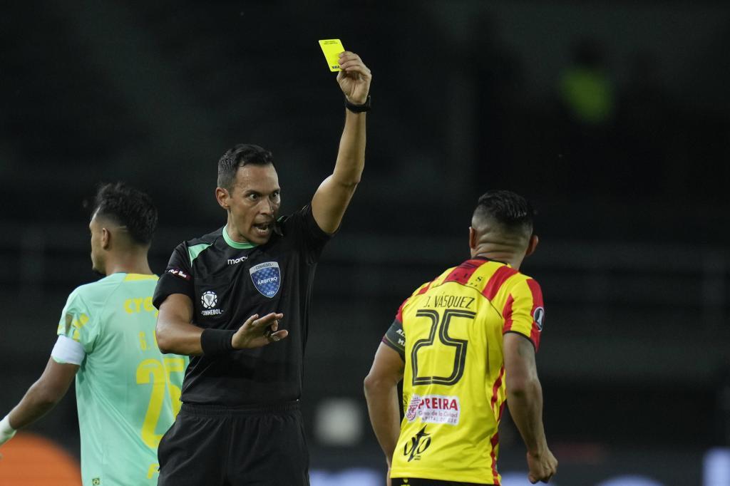 Referee Facundo Tello of Argentina.