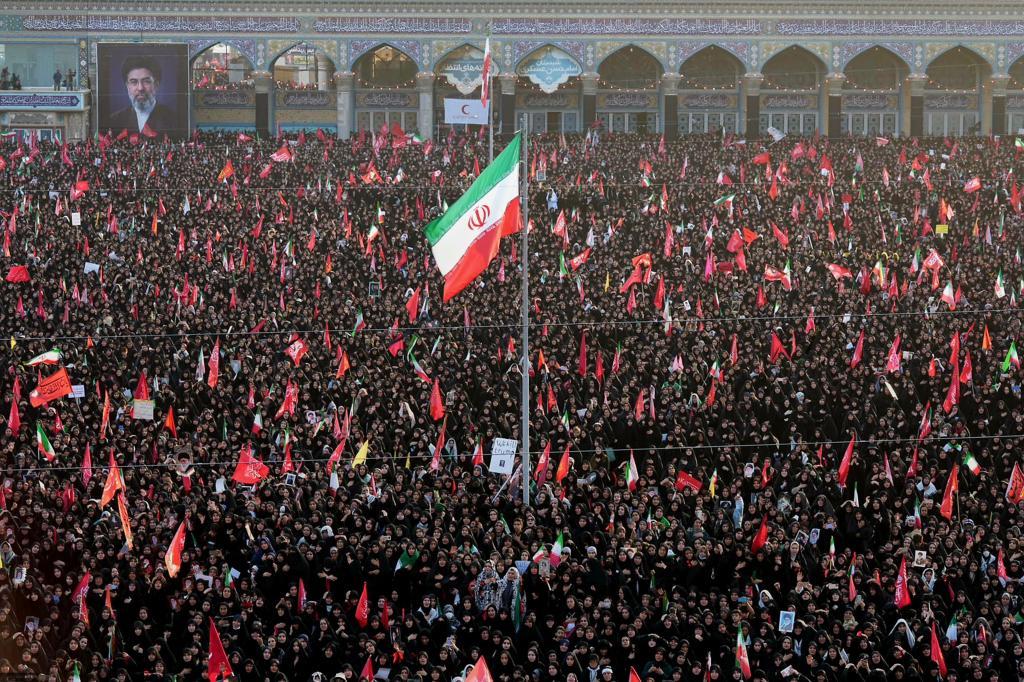Mourners attend funeral prayers held as part of the dayslong funeral ceremonies for the late Iranian Supreme Leader Ayatollah Ali Khamenei