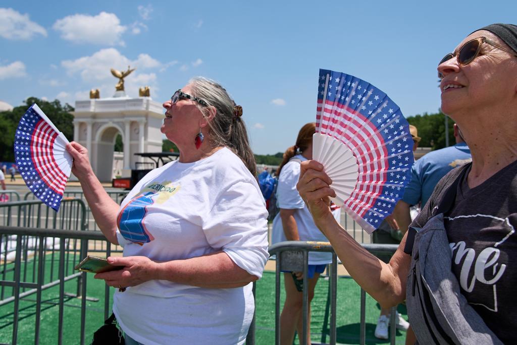 People waiting in line for the ferris wheel at the Great American State Fair on the National Mall
