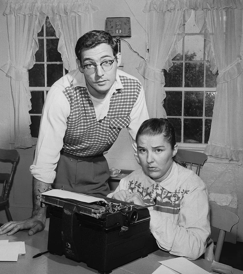 Grace Metalious and her husband, George, at home in front of the typewriter.