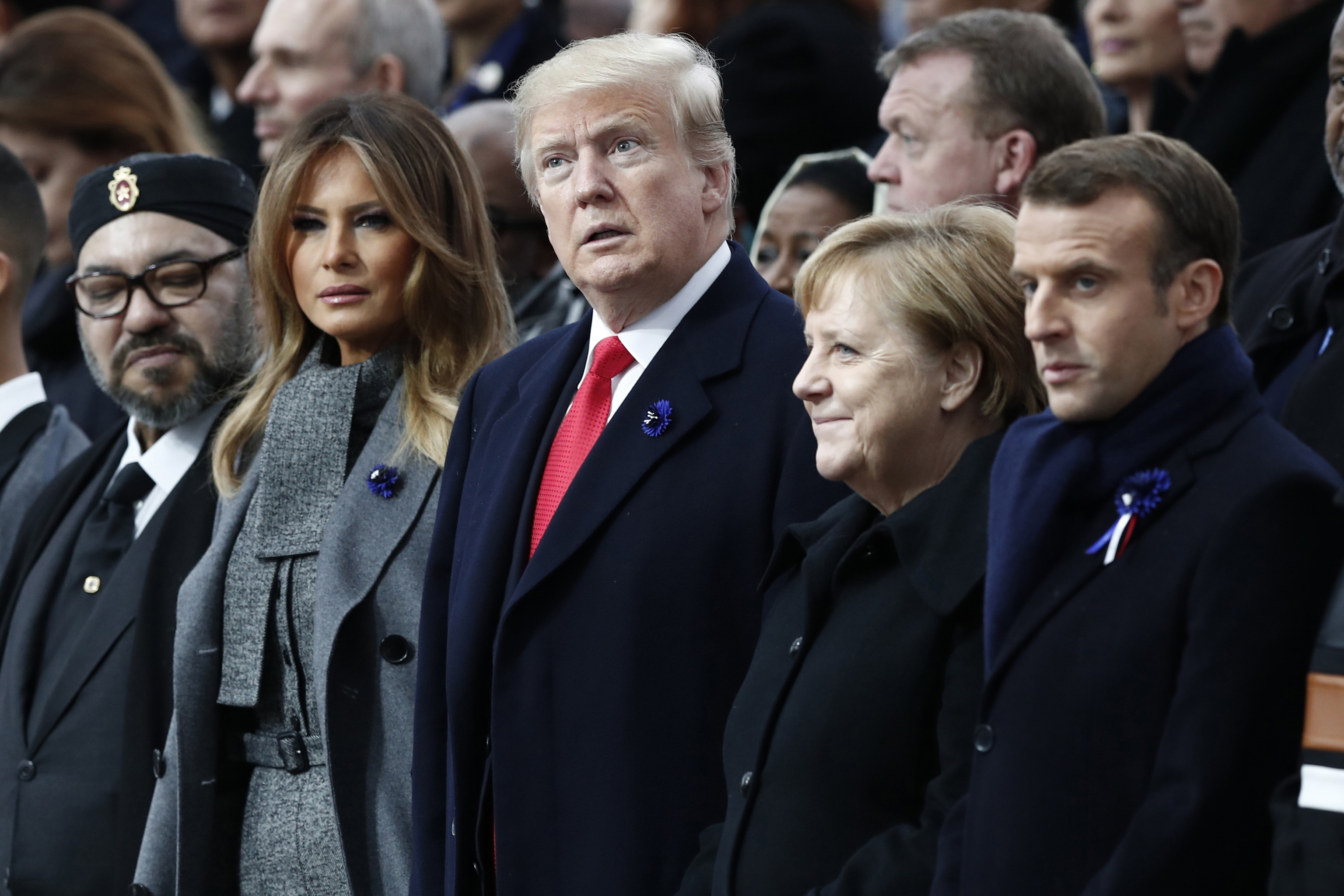 French President Emmanuel Macron, German Chancellor Angela Merkel, U.S. President Donald Trump, first lady Melania Trump, Morocco's King Mohammed VI.