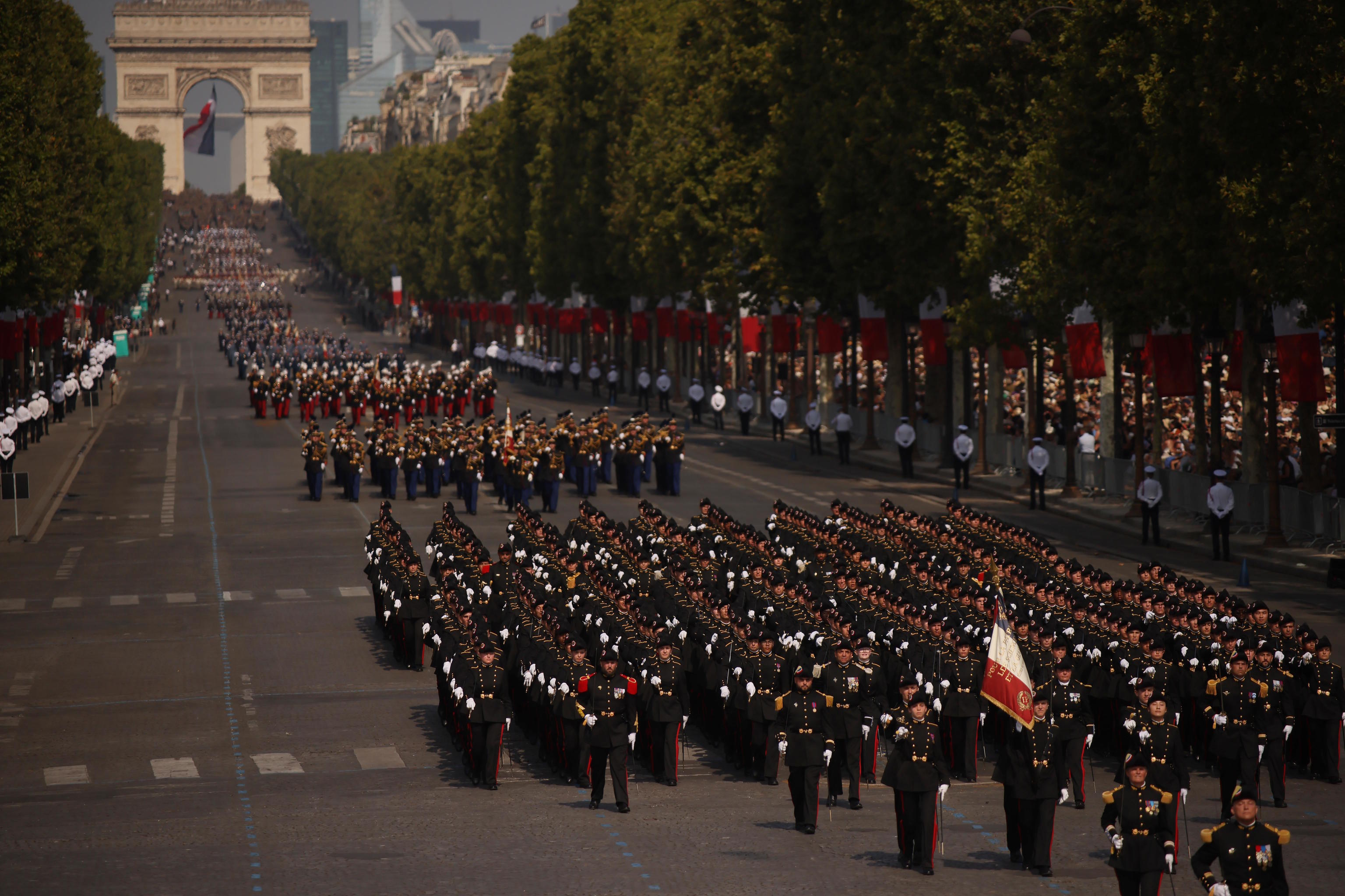 French soldiers march during the Bastille Day military parade on the Champs-Elysees avenue, in Paris.